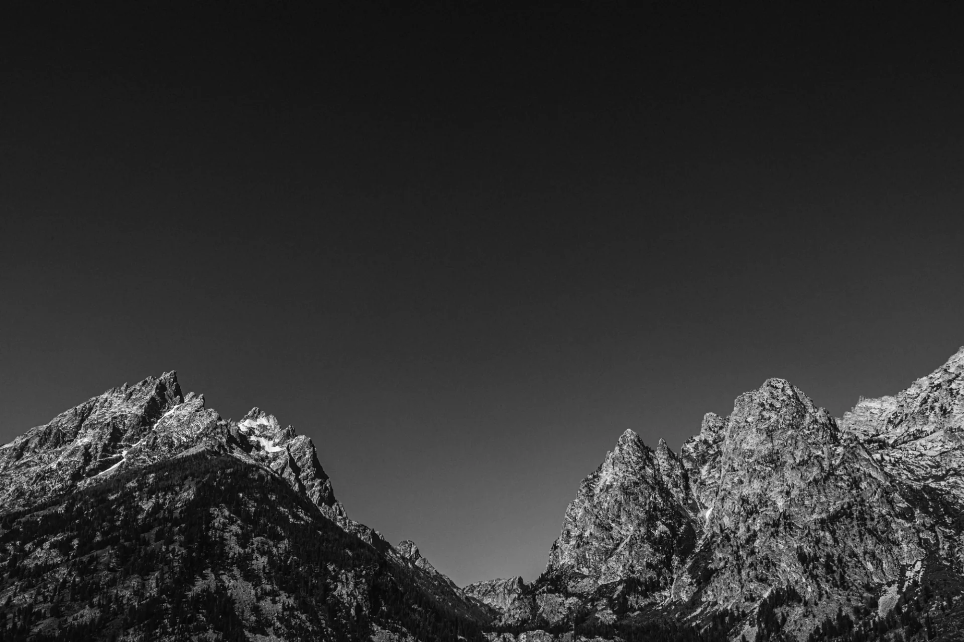Black-and-white photograph of the Cathedral Group peaks in Grand Teton National Park